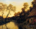 Un paysage de rivière français au coucher du soleil Louis Aston Knight
